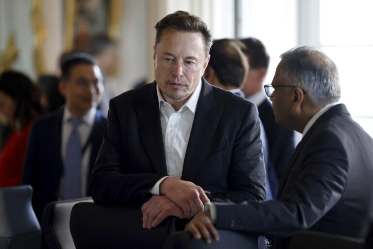 Twitter, now X. Corp, and Tesla CEO Elon Musk talks with Chairman of Tata Sons Natarajan Chandrasekaran prior to a meeting during the 6th edition of the 