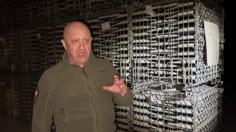 In this grab taken from video released by Prigozhin Press Service on Monday, May 29, 2023, Yevgeny Prigozhin's Wagner Group military company speaks to camera at a champagne warehouse in Bakhmut, Ukraine. Wagner head Yevgeny Prigozhin posted a video Monday showing him walking through a champagne warehouse and claiming that he is handing over the Bakhmut factory of sparkling wines to the Russian military. (Prigozhin Press Service via AP)