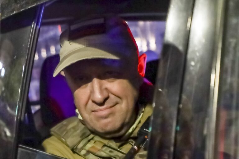 Yevgeny Prigozhin, the owner of the Wagner Group military company, looks out from a military vehicle on a street in Rostov-on-Don, Russia, Saturday, June 24, 2023, leaving an area of the headquarters of the Southern Military District. Kremlin spokesman Dmitry Peskov said that Prigozhin's troops who joined him in the uprising will not face prosecution and those who did not will be offered contracts by the Defense Ministry. After the deal was reached Saturday, Prigozhin ordered his troops to halt their march on Moscow and retreat to field camps in Ukraine, where they have been fighting alongside Russian troops. (AP Photo)
