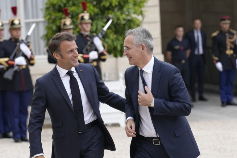 French President Emmanuel Macron, left, welcomes NATO Secretary General Jens Stoltenberg before their talks Wednesday, June 28, 2023 at the Elysee Palace in Paris. NATO Secretary-General Jens Stoltenberg said earlier that he has called a meeting of senior officials from Turkey, Sweden and Finland on July 6 to try to overcome Turkish objections to Sweden joining the military organization. (AP Photo/Christophe Ena)