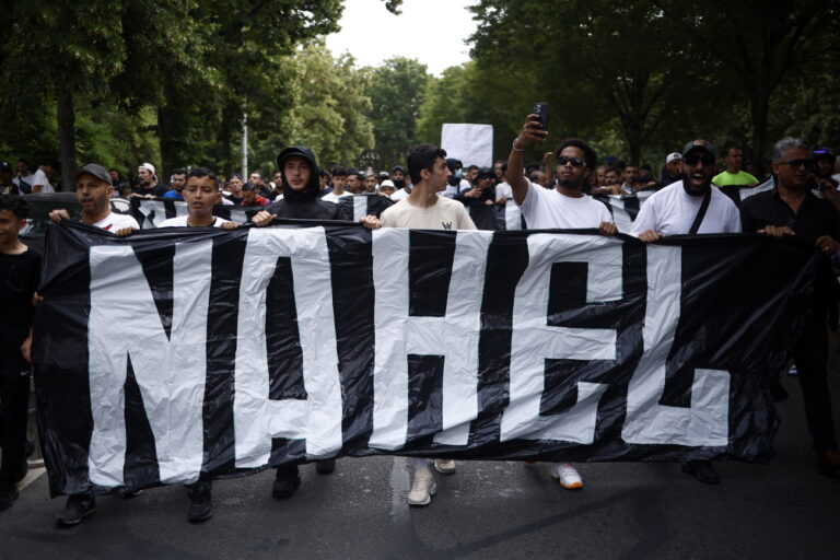 epa10717295 People attend a march in memory of 17-year-old Nahel who was killed by French Police in Nanterre, near Paris, France, 29 June 2023. Violence broke out after the police fatally shot a 17-year-old during a traffic stop in Nanterre on 27 June 2023. According to the French interior minister, 31 people were arrested with 2,000 officers being deployed to prevent further violence. EPA/YOAN VALAT