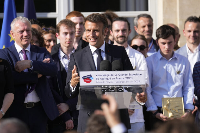 French President speaks as he inaugurates an exhibition dedicated to produces made in France, Friday, June 30, 2023 at the Elysee palace in Paris. (AP Photo/Michel Euler, Pool)