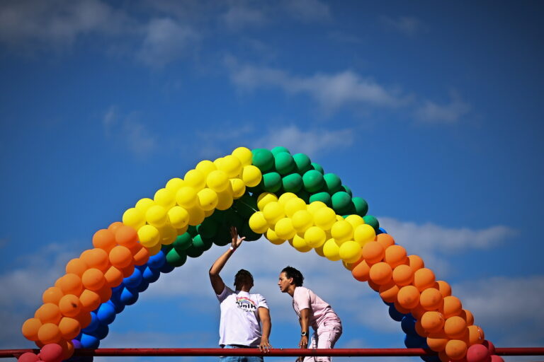 epa10736806 People participate in the 24th edition of the Brasilia LGBT+ Pride March, on the esplanade of the Ministries in Brasilia, Brazil, 09 July 2023. With the march towards the National Congress, the capital of Brazil ends its 2023 Pride festival, which began on June 24 and which developed recreational, cultural, and educational activities around diversity and the claim of rights of the LGBT+ community. EPA/Andre Borges