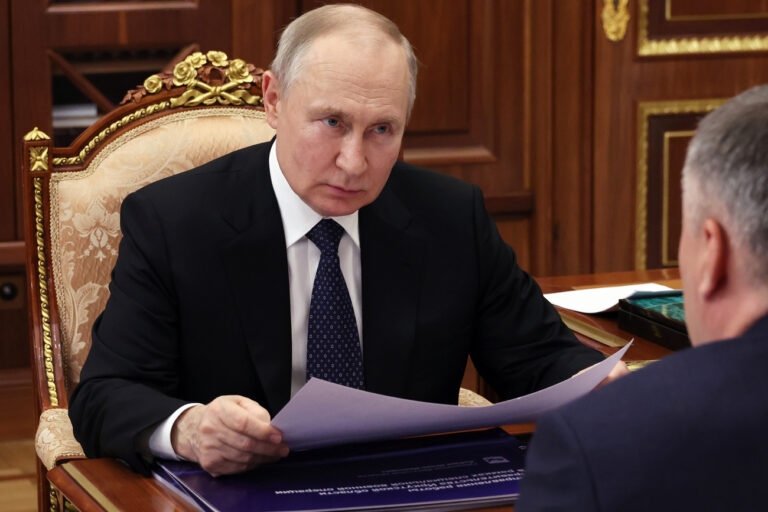Russian President Vladimir Putin meets with Irkutsk Region Governor Igor Kobzev, in Moscow, Russia, Monday, July 17, 2023. (Alexander Kazakov, Sputnik, Kremlin Pool Photo via AP)