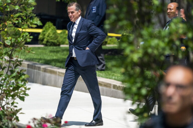 epa10770131 Hunter Biden departs the US Federal District Court in Wilmington, Delaware, USA, 26 July 2023. Hunter Biden's hearing ended with him pleading not guilty after US District Judge Maryellen Noreika said she was not ready to accept the plea deal. EPA/SHAWN THEW