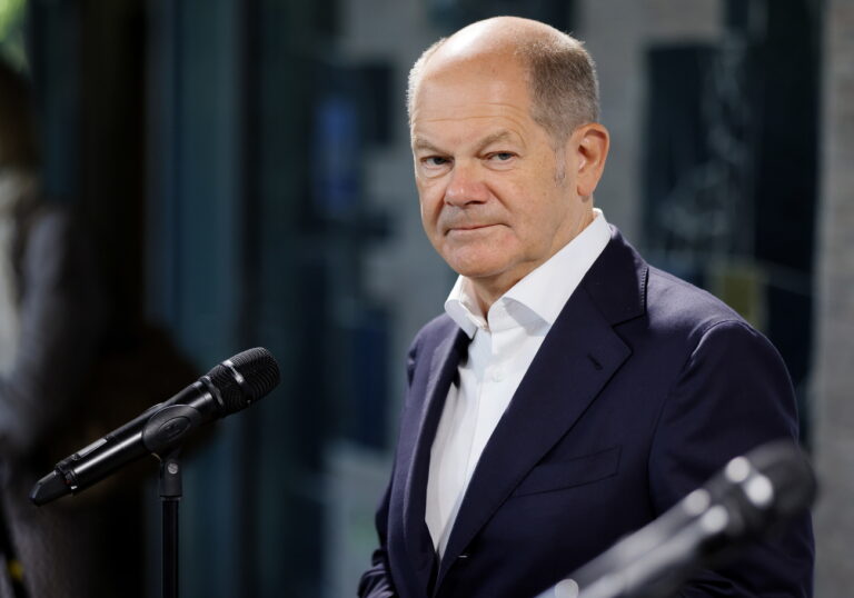 epa10794539 German Chancellor Olaf Scholz gives a statement during his visit at the Federal Statistical Office on the occasion of its 75th anniversary in Wiesbaden, Germany, 11 August 2023. EPA/RONALD WITTEK