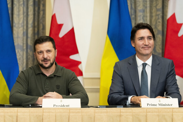 Canadian Prime Minister Justin Trudeau, right, and Ukrainian President Volodymyr Zelenskyy meet with business leaders in Toronto, on Friday, Sept. 22, 2023. (Spencer Colby/The Canadian Press via AP)