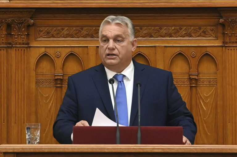 Hungarian Prime Minister Viktor Orban delivers his address on the opening day of the parliament's autumn session in Budapest, Hungary, Monday, Sept. 25, 2023. (Zoltan Mathe/MTI via AP)