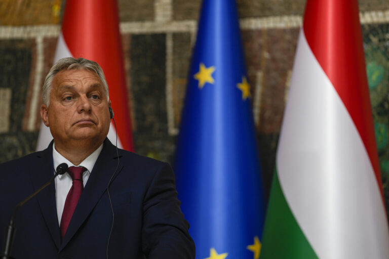 Hungarian Prime Minister Viktor Orban listens to Serbian President Aleksandar Vucic during a press conference after talks at the Serbia Palace in Belgrade, Serbia, Friday, Sept. 29, 2023. Orban is on a one day visit to Serbia. (AP Photo/Darko Vojinovic)