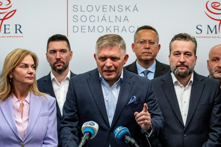 epa10893653 Slovak former Prime Minister and chairman of the Smer-SD party Robert Fico (C) talks to media after Slovakia's parliamentary elections at party's headquarters in Bratislava, Slovakia, 01 October 2023. According to official results, Smer-SD party with leader Robert Fico won the parliamentary elections with almost 23 percent. Progresivne Slovensko party (Progressive Slovakia) ended up behind him, with almost 18 percent. EPA/MARTIN DIVISEK