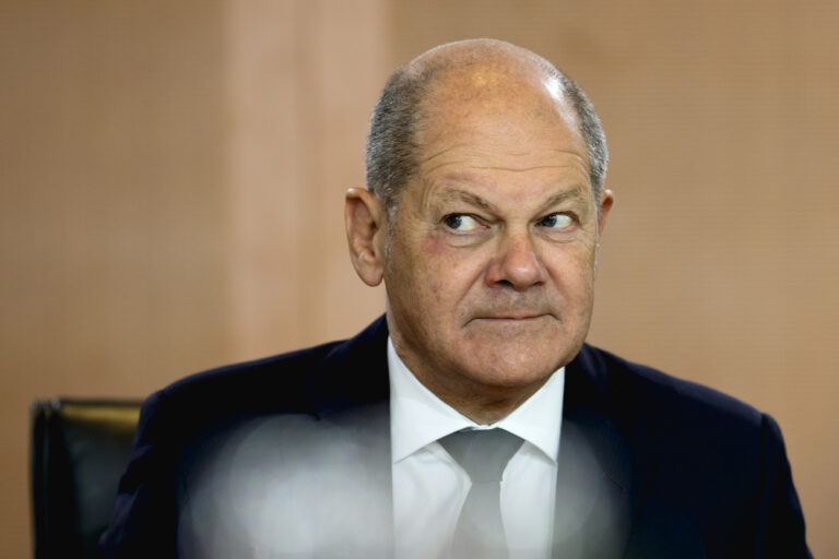 German Chancellor Olaf Scholz leads the German government cabinet meeting at the chancellery in Berlin, Germany, Wednesday, Oct. 4, 2023. (AP Photo/Markus Schreiber)
