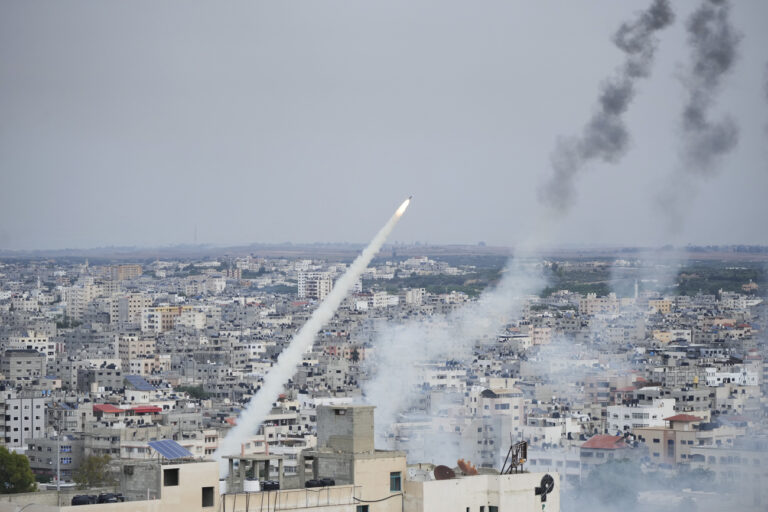Rockets are launched by Palestinian militants from the Gaza Strip towards Israel, in Gaza, Saturday, Oct. 7, 2023. The militant Hamas rulers of the Gaza Strip carried out an unprecedented, multi-front attack on Israel at daybreak Saturday, firing thousands of rockets as dozens of Hamas fighters infiltrated the heavily fortified border in several locations by air, land, and sea and catching the country off-guard on a major holiday. (AP Photo/Hatem Moussa)