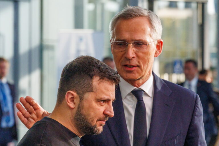 epa10912580 NATO Secretary General Jens Stoltenberg (R) and Ukraine's President Volodymyr Zelensky hold a joint doorstep statement ahead of a two-day NATO Defense Ministers Council at the Alliance headquarters in Brussels, Belgium, 11 October 2023. EPA/OLIVIER MATTHYS