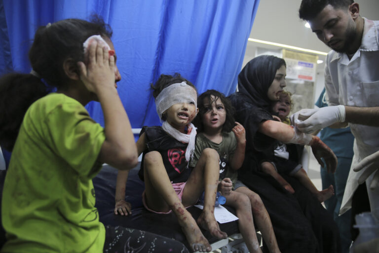 Palestinian children wounded in Israel strikes are brought to Shifa Hospital in Gaza City on Wednesday, Oct. 11, 2023. (AP Photo/Ali Mahmoud)