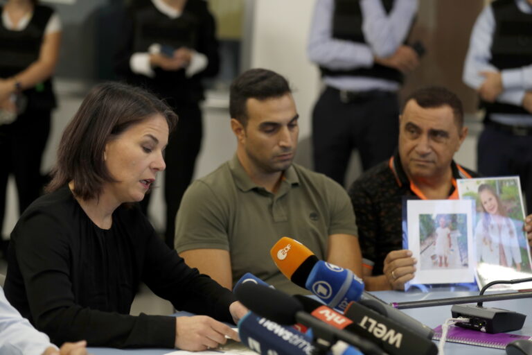 epa10916640 German Foreign Minister Annalena Baerbock (L) attends a press conference with her Israeli counterpart during a visit to the command center of the city of Netivot, near border with the Gaza Strip, in southern Israel, 13 October 2023. Baerbock is in Israel on a one‑day visit to 'underscore' the German Government's solidarity with Israel, the German Foreign Ministry said. EPA/ATEF SAFADI