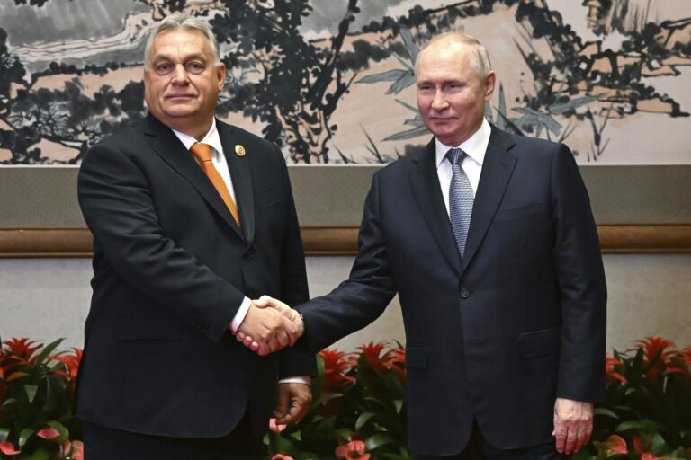 Russian President Vladimir Putin, right, and Hungarian Prime Minister Viktor Orban pose for a photo prior to their talks on the sidelines of the Belt and Road Forum in Beijing, China, on Tuesday, Oct. 17, 2023. (Grigory Sysoyev, Sputnik, Kremlin Pool Photo via AP)