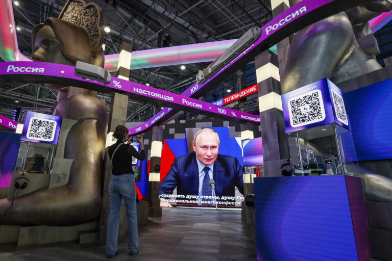 epa10976688 Russian President Vladimir Putin is shown speaking on a big screen during the International Exhibition-forum Russia in Moscow, Russia, 15 November 2023. The International Exhibition-forum Russia, designed to demonstrate Russian main achievements in technology, science, tourism and culture, runs from 04 November 2023 to 12 April 2024. EPA/YURI KOCHETKOV