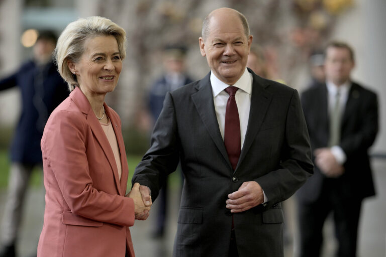 German Chancellor Olaf Scholz, right, welcomes European Commission President Ursula von der Leyen, left, at the G20 Investment Summit - German Business and the CwA Countries on the sidelines of a Compact with Africa in Berlin, Germany, Monday, Nov. 20, 2023. In the high-level conference investment summit the African Compact partner countries meet with high-ranking representatives of German companies to explore investments under the framework of the G20 partnership with Africa. (AP Photo/Markus Schreiber)