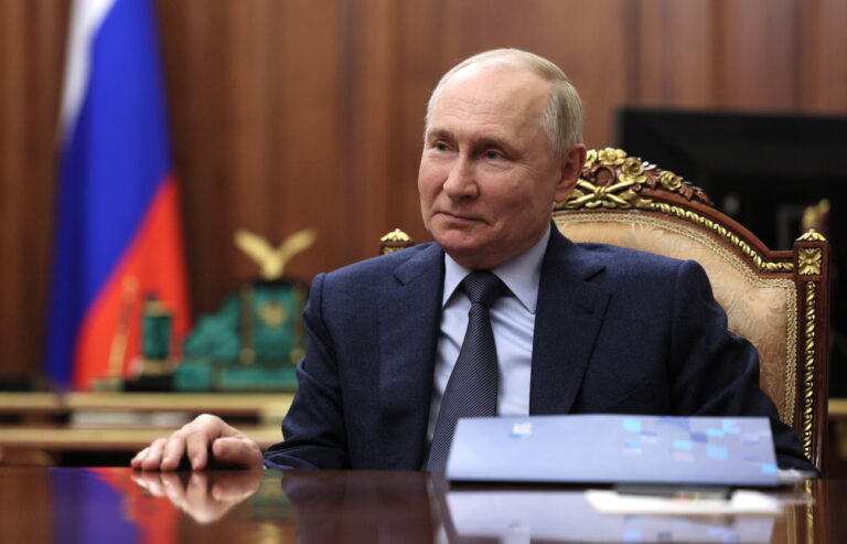 epa10997759 Russian President Vladimir Putin smiles during a meeting with VTB bank Chairman Andrey Kostin in the Kremlin in Moscow, Russia, 27 November 2023. In 2024, VTB expects a slowdown in the growth of the banking sector and a decline in its income against the backdrop of measures taken by the Bank of Russia - raising rates, limiting lending, including consumer lending, Kostin said. EPA/MIKHAEL KLIMENTYEV/SPUTNIK/KREMLIN / POOL MANDATORY CREDIT