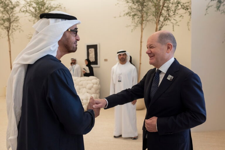 epa11006113 A handout photo made available by the UAE Presidential Court shows President of the United Arab Emirates and Ruler of Abu Dhabi Mohamed bin Zayed Al Nahyan (L) meets with German Cancellor Olaf Scholz during the UN Climate Change Conference COP28, in Dubai, United Arab Emirates, 01 December 2023. The 2023 United Nations Climate Change Conference (COP28), runs from 30 November to 12 December, and is expected to host one of the largest number of participants in the annual global climate conference as over 70,000 estimated attendees, including the member states of the UN Framework Convention on Climate Change (UNFCCC), business leaders, young people, climate scientists, Indigenous Peoples and other relevant stakeholders will attend. EPA/RYAN CARTER / UAE PRESIDENTIAL COURT / HANDOUT HANDOUT EDITORIAL USE ONLY/NO SALES HANDOUT EDITORIAL USE ONLY/NO SALES