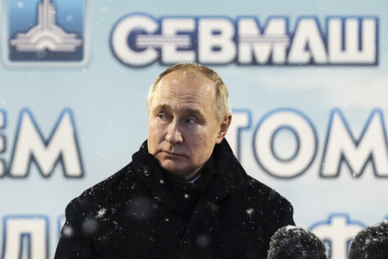 Russian President Vladimir Putin delivers his speech as he attends a flag-raising ceremony for newly-built nuclear submarines at the Sevmash shipyard in Severodvinsk in Russia's Archangelsk region, Monday, Dec. 11, 2023. The navy flag was raised on the Emperor Alexander III and the Krasnoyarsk submarines during Monday's ceremony. Putin has traveled to a northern shipyard to attend the commissioning of new nuclear submarines, a visit that showcases the country's nuclear might amid the fighting in Ukraine. (Kirill Iodas, Sputnik, Kremlin Pool Photo via AP)
