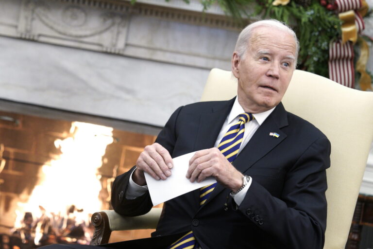 epa11025200 US President Joe Biden reacts during a bilateral meeting with Ukrainian President President Volodymyr Zelensky (not pictured) in the Oval Office of the White House in Washington, DC, USA, 12 December 2023. EPA/Yuri Gripas/ABACA / POOL