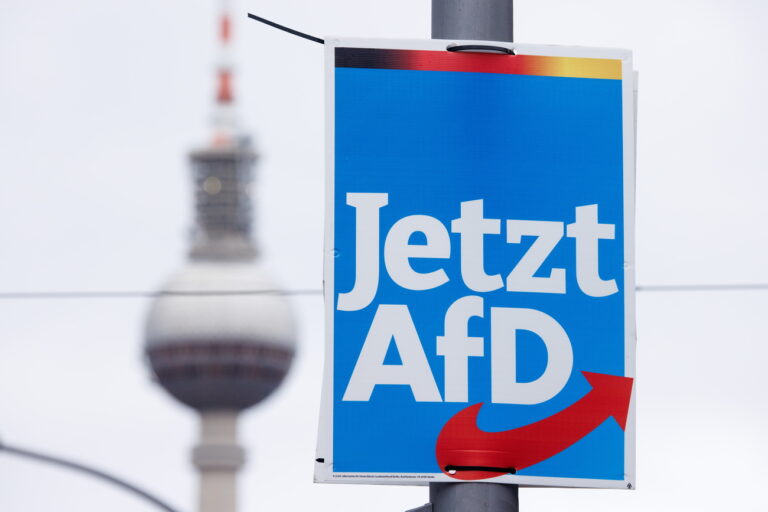 epa11057239 A campaign poster of the right-wing Alternative for Germany (Alternative fuer Deutschland, AfD) party reads 'Now AfD!', on a lamp post in front of the TV tower in Prenzlauer Berg district in Berlin, Germany, 04 January 2024. On 19 December 2023, the German Federal Constitutional Court ruled that the election to the 20th German Bundestag must be repeated in 455 Berlin constituencies. The date for the partial election rerun is 11 February 2024. EPA/CLEMENS BILAN
