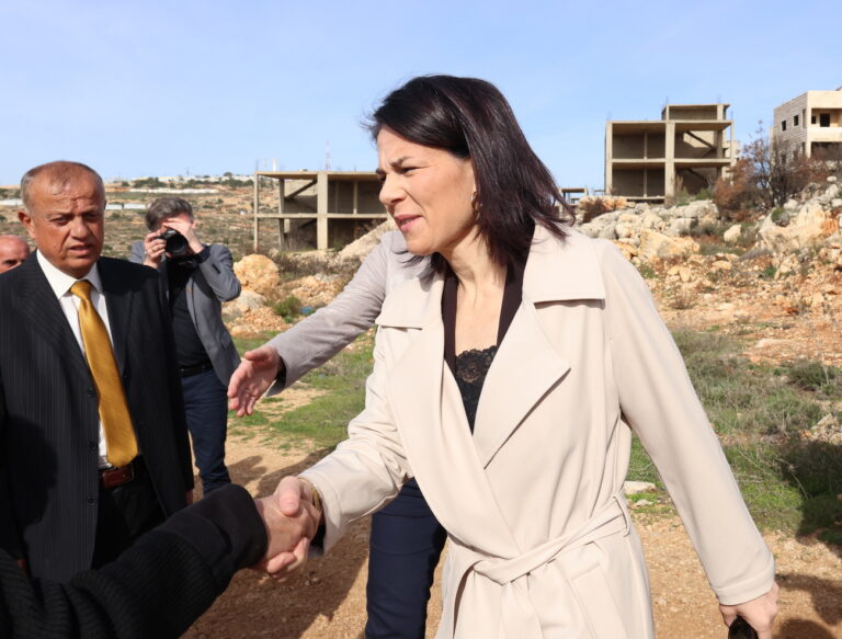 epa11064255 German Foreign Minister Annalena Baerbock visits the village of Ala Mazraa near the West Bank town of Ramallah, 08 January 2024. Baerbock also visited Israel on her currently trip to the Middle East. EPA/ALAA BADARNEH