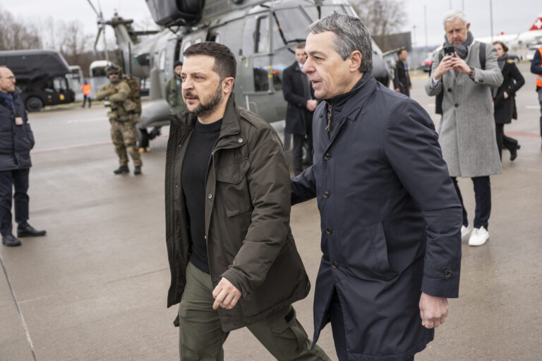 Switzerland's Foreign Minister Federal Councillor Ignazio Cassis, right, welcomes Volodymyr Zelenskyy, President of Ukraine, left, on Monday, January 15, 2024 at the Airport of Zurich Kloten, Switzerland. Zelenskyy will attend the World Economic Forum in Davos starting Tuesday. (KEYSTONE/POOL/Alessandro della Valle)