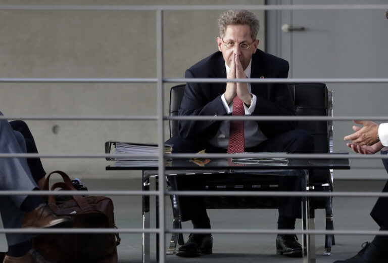 FILE - Hans-Georg Maassen, then head of the German Federal Office for the Protection of the Constitution waits for the beginning of a hearing at the home affairs committee of the German federal parliament, Bundestag, in Berlin, Germany, Wednesday Sept. 12, 2018. Germany's domestic intelligence agency has put its former head, who has become a hard-right politician since being removed from the job several years ago, under scrutiny. Hans-Georg Maassen posted a letter from the BfV agency to his lawyer on his website Wednesday, Jan. 31, 2024, following a report that the authority he led from 2012 to 2018 now has him in its files on right-wing extremism. (AP Photo/Michael Sohn, File)