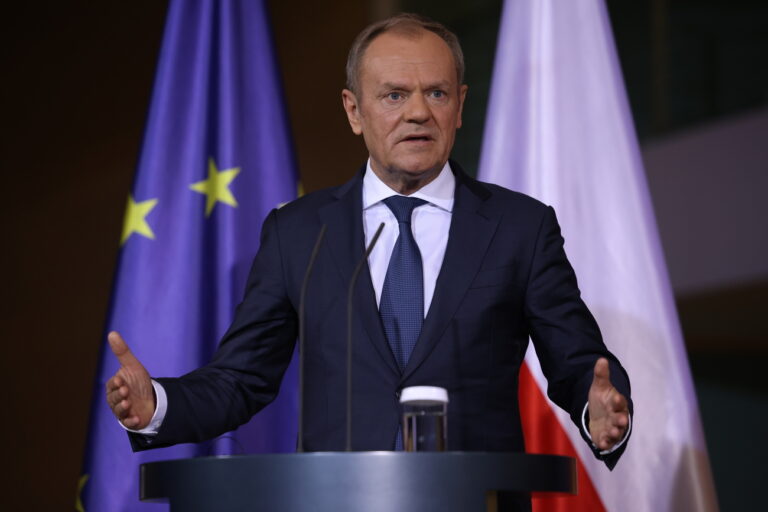 epa11148284 Polish Prime Minister Donald Tusk gestures next to German Chancellor Olaf Scholz (not in the picture) during a joint press conference at the chancellery in Berlin, Germany, 12 February 2024. German Chancellor Olaf Scholz and Polish Prime Minister Donald Tusk met for bilateral talks. EPA/CLEMENS BILAN