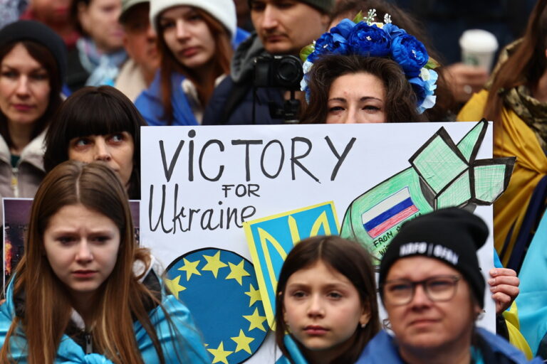 epa11160668 A participant holds a placard reading 'victory for Ukraine' in a Ukraine related protest in the course of the 60th Munich Security Conference (MSC) during a rally in Munich, Germany, 17 February 2024. More than 500 high-level international decision-makers meet at the 60th Munich Security Conference in Munich during their annual meeting from 16 to 18 February 2024 to discuss global security issues. EPA/ANNA SZILAGYI