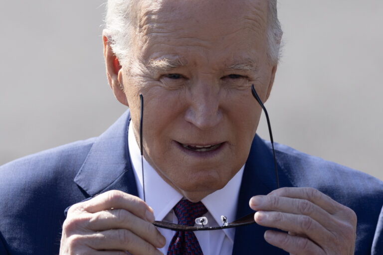epa11168482 US President Joe Biden approaches to briefly speak to members of the news media before departing the South Lawn of the White House by Marine One, in Washington, DC, USA, 20 February 2024. US President Joe Biden travels on a two-day trip to California where he will attend campaign events. EPA/MICHAEL REYNOLDS