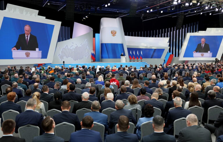 epa11188446 Russian President Vladimir Putin delivers his annual address to the Federal Assembly at the Gostiny Dvor conference center in Moscow, Russia, 29 February 2024. About 1,200 people, including lawmakers of RussiaâÄ™s two-chamber parliament, Government members, heads of the Constitutional and Supreme court, and regional governors, were invited to attend the event. EPA/GAVRIIL GRIGOROV/SPUTNIK/KREMLIN POOL / POOL MANDATORY CREDIT