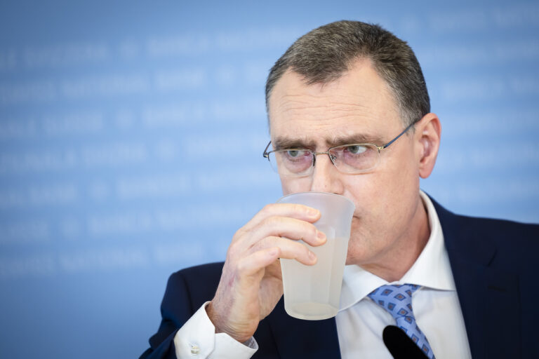 Swiss National Bank's (SNB) Chairman of the Governing Board Thomas Jordan drinks during a media briefing at the Swiss National Bank in Zurich, Switzerland, on Thursday, March 21, 2024. (KEYSTONE/Michael Buholzer).