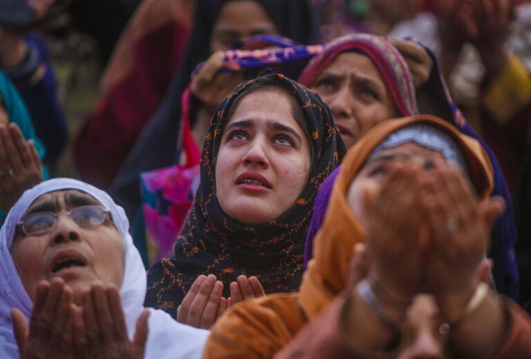 epa11254157 Muslim women pray as the head priest (not pictured) displays the holy relic believed to be hair from the beard of the Prophet Muhammad, during special prayers to observe the Martyr Day of Hazrat Ali, cousin of Prophet Muhammad, on the 21st day of Ramadan, at the Hazratbal Shrine in Srinagar, the summer capital of Indian Kashmir, 01 April 2024. Hazrat Ali was killed on the 21st day of the holy month of Ramadan more than 1,400 years ago. EPA/FAROOQ KHAN