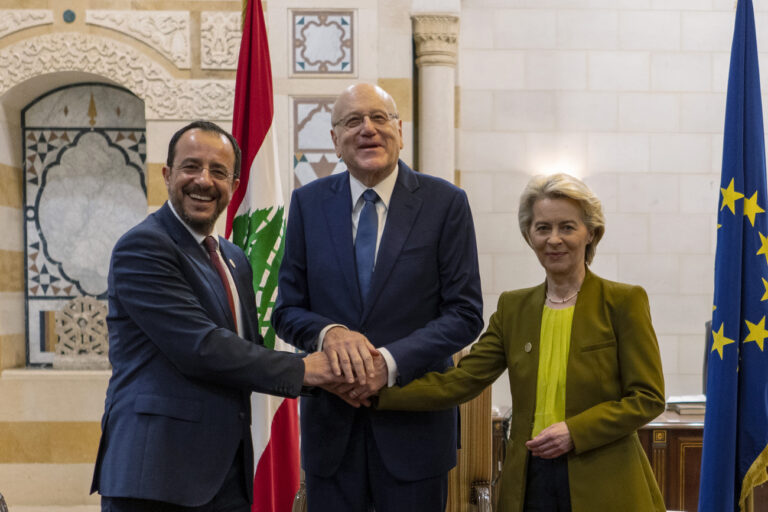 Lebanese caretaker Prime Minister Najib Mikati, center, welcomes Cyprus' President Nikos Christodoulides, left, and Ursula von der Leyen, president of the European Commission, pose for a photograph at the government palace in Beirut, Lebanon, Thursday, May 2, 2024. (AP Photo/Hassan Ammar)