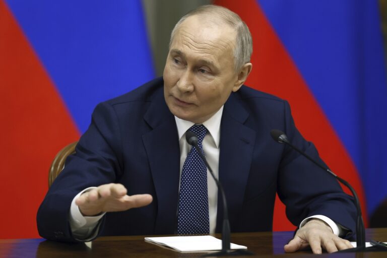 Russian President Vladimir Putin gestures during a meeting with Cabinet members in Moscow, Russia, Monday, May 6, 2024. Putin thanked Cabinet ministers for their work ahead of his inauguration Tuesday. (Alexander Astafyev, Sputnik, Government Pool Photo via AP)