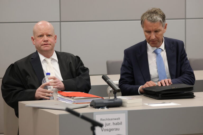 epa11340348 Bjoern Hoecke (R), a former history teacher and current leader of the far-right Alternative for Germany (AfD) political party in the state of Thuringia, and his lawyer Ulrich Vosgerau arrive to hear the verdict in Hoecke's trial for using a banned Nazi-era slogan in Halle, Germany, 14 May 2024. The court imposed a fine of 13,000 euros on Hoecke. Prosecutors accused Hoecke of having concluded a political rally in Merseburg in 2021 by yelling out 'Alles fuer Deutschland' (Everything for Germany), a slogan used by Nazi-era SA stormtroopers, the use of which is a felony in modern Germany. The state of Thuringia is among three Eastern German states scheduled to hold state elections in September 2024, and in all three the AfD is currently leading in polls. EPA/SEAN GALLUP / POOL