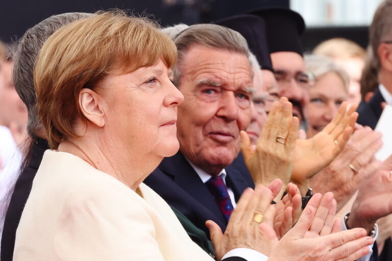 epa11363054 Former German Chancellors Angela Merkel and Gerhard Schroeder attend a state act to mark the 75th anniversary of the German Basic Law (Grundgesetz) in Berlin, Germany, 23 May 2024. The Basic Law for the Federal Republic of Germany of 23 May 1949 is the constitution of Germany. EPA/CHRISTIAN MARQUARDT / POOL