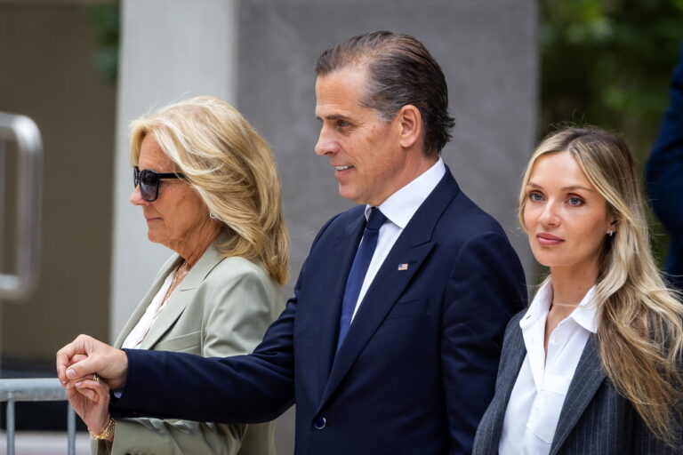 epa11404264 Hunter Biden (C) holds hands with First Lady Jill Biden (L) and wife Melissa Cohen Biden (R), as he departs his federal gun trial after a jury found him guilty of three gun charges at the US Federal District Court in Wilmington, Delaware, USA, 10 June 2024. Hunter Biden is the first child of a sitting president to be convicted in a federal court. EPA/JIM LO SCALZO