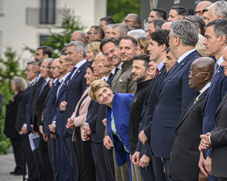 Heads of states pose for a traditional family photo as Swiss Federal President Viola Amherd leans forward during the Summit on peace in Ukraine, in Stansstad near Lucerne, Switzerland, Saturday, June 15, 2024. Heads of state from around the world gather on the Buergenstock Resort in central Switzerland for the Summit on Peace in Ukraine, on June 15 and 16. (KEYSTONE/EDA/POOL/Alessandro della Valle)