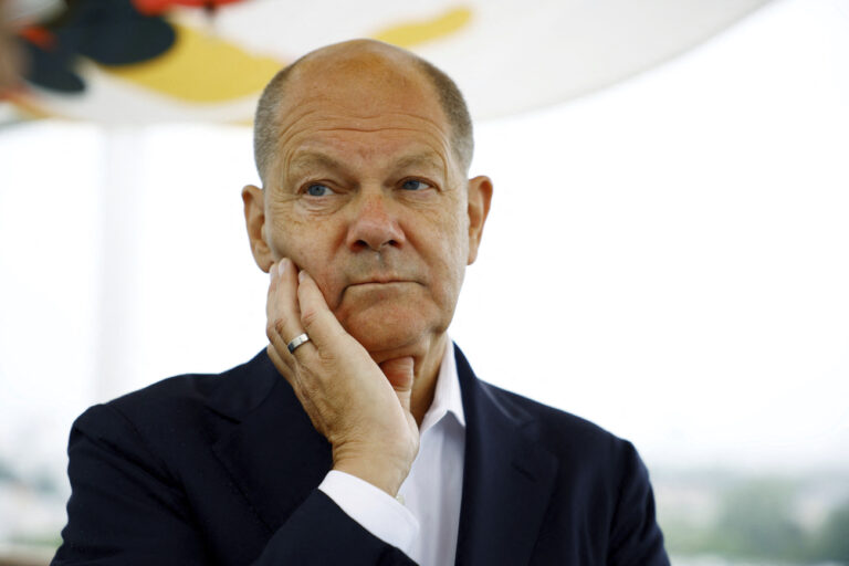 German Chancellor Olaf Scholz visits the Olympic Village during the 2024 Summer Olympics, Saturday, July 27, 2024, in Paris, France. (Sarah Meyssonnier/Pool Photo via AP)