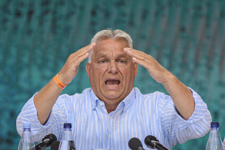 Hungarian Prime Minister Viktor Orban delivers a speech at Tusvanyos Summer University, in Baile Tusnad, Harghita county, Romania, Saturday, July 27, 2024. Orbán said the European Union is sliding toward oblivion in a rambling anti-Western speech in which he warned of a new, Asia-oriented “world order.” (AP Photo/Alexandru Dobre)