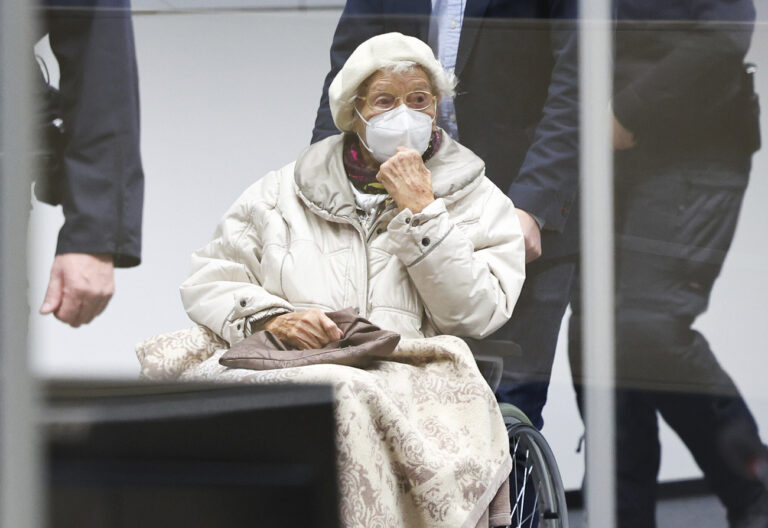 FILE - Irmgard Furchner, accused of being part of the apparatus that helped the Nazis' Stutthof concentration camp function, appears in court for the verdict in her trial in Itzehoe, Germany, Dec. 20, 2022. (Christian Charisius/Pool Photo via AP, File)