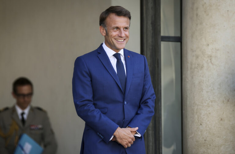 French President Emmanuel Macron waits at the Elysee Palace as French left-wing coalition accused Emmanuel Macron of denying democracy after he has rejected the New Popular Front's candidate to form a new government following last month's inconclusive election, Tuesday, Aug. 27, 2024 in Paris. (AP Photo/Thomas Padilla)