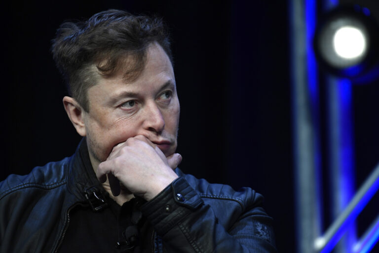 FILE - Tesla and SpaceX chief executive officer Elon Musk listens to a question as he speaks at the SATELLITE Conference and Exhibition in Washington, March 9, 2020. (AP Photo/Susan Walsh, File).Elon Musk