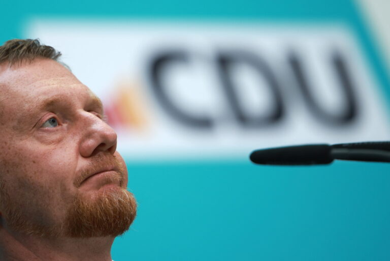 epa11579749 Saxony Premier and top candidate of the Christian Democratic Union (CDU) for regional elections in Saxony, Michael Kretschmer, looks on during a press conference at the Christian Democrats headquarters, Konrad-Adenauer-Haus, in Berlin, Germany, 02 September 2024. The far-right Alternative for Germany (AfD) has won first place in the state elections in Thuringia and is only just behind the CDU in second place in Saxony. Not since 1945 has a German far-right party been number one in an election. It is likely to be difficult to form a stable government in both federal states. The AfD is claiming to be in government, but the other parties are rejecting a coalition with it. EPA/CLEMENS BILAN