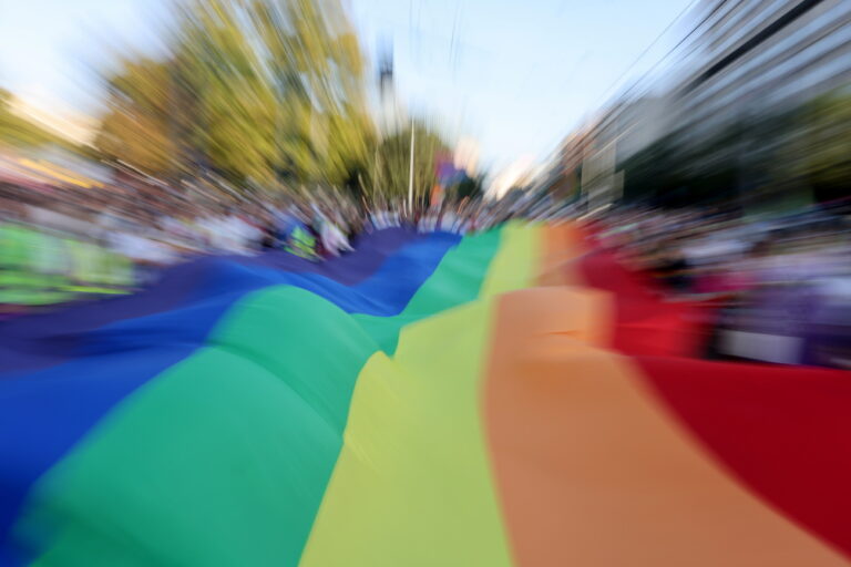 epa11591812 Participants wave a giant rainbow colored flag during the Belgrade Pride Parade march in Belgrade, Serbia, 07 September 2024. Holding rainbow colored flags, balloons and banners participants marched through the main streets of Serbia's capital near the main institutions in the city to which Belgrade Pride has been addressing its demands for improved rights for the LGBTQ+ community. EPA/ANDREJ CUKIC