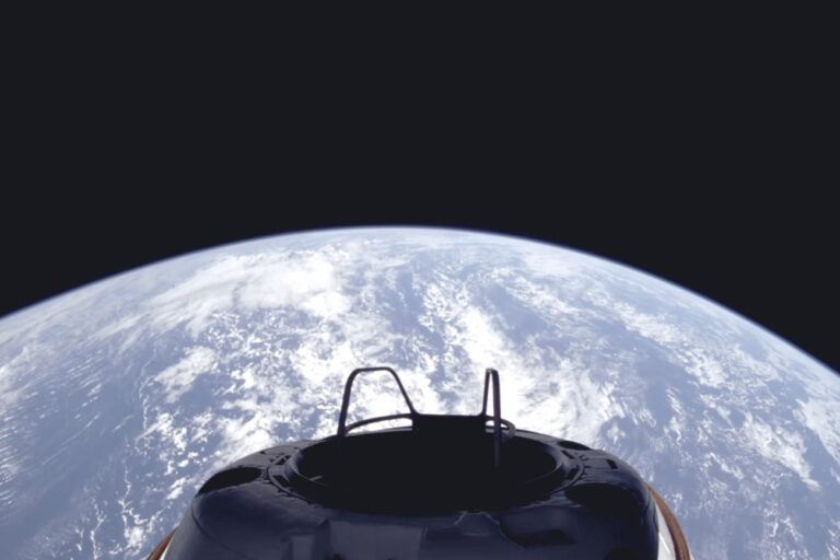 This image provided by SpaceX on Tuesday, Sept. 10, 2024, shows a view of Earth and the Dragon capsule's Skywalker spacewalk platform shortly after the Polaris Dawn crew launched into an orbit. (SpaceX via AP)